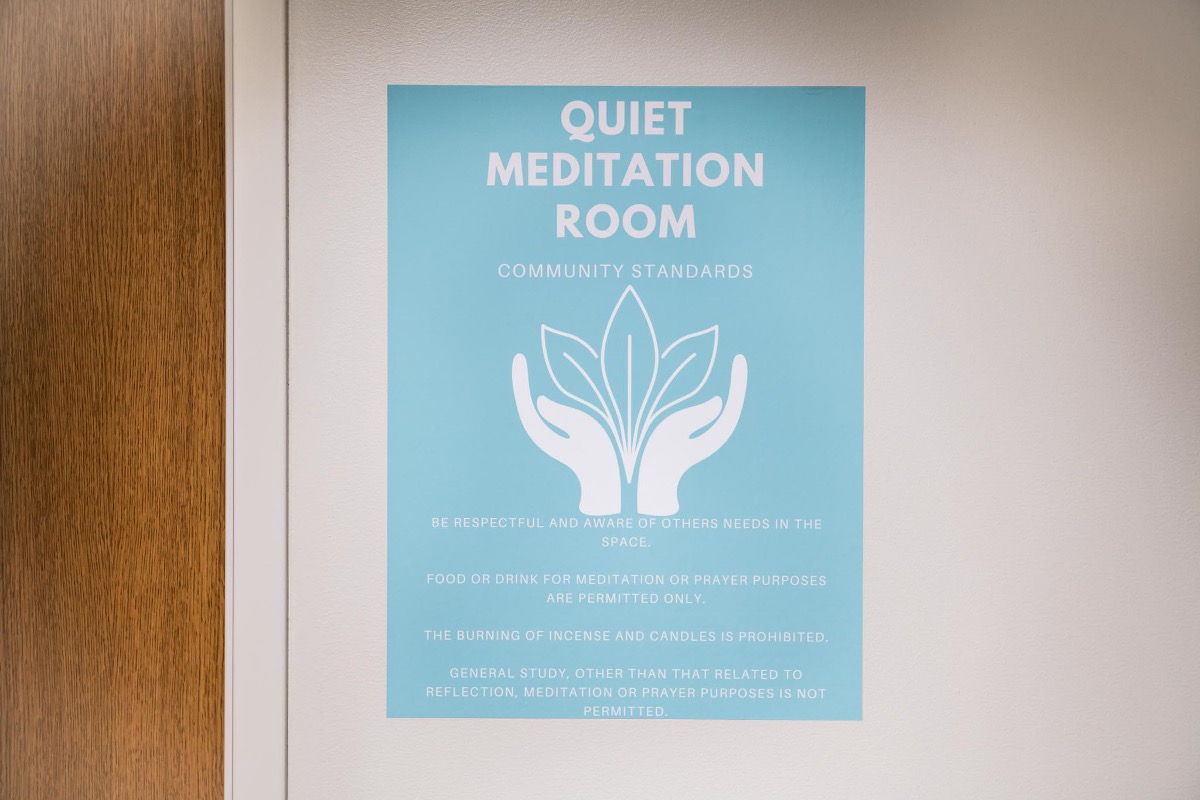 Quiet Meditation room poster with hands cupping leaves