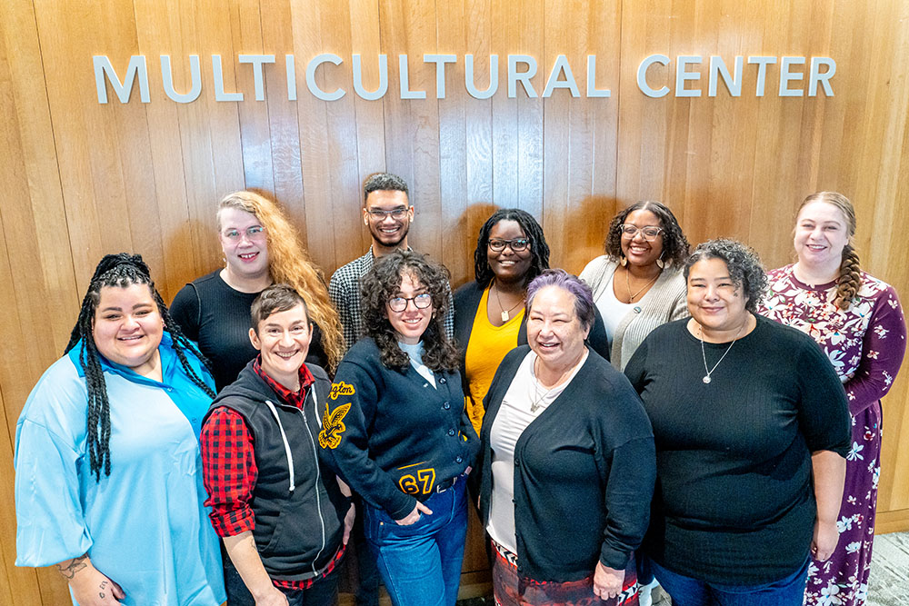 a group of professional staff who work in the MCC. From left to right, Ayanna Phillips, Tulea Enochs, Litav Langley, JoeHahn, Amelia Flores, Chelsea Joefield, Laural Ballew, Nia Gipson, Amy Salinas Westmoreland, simone-calais staley