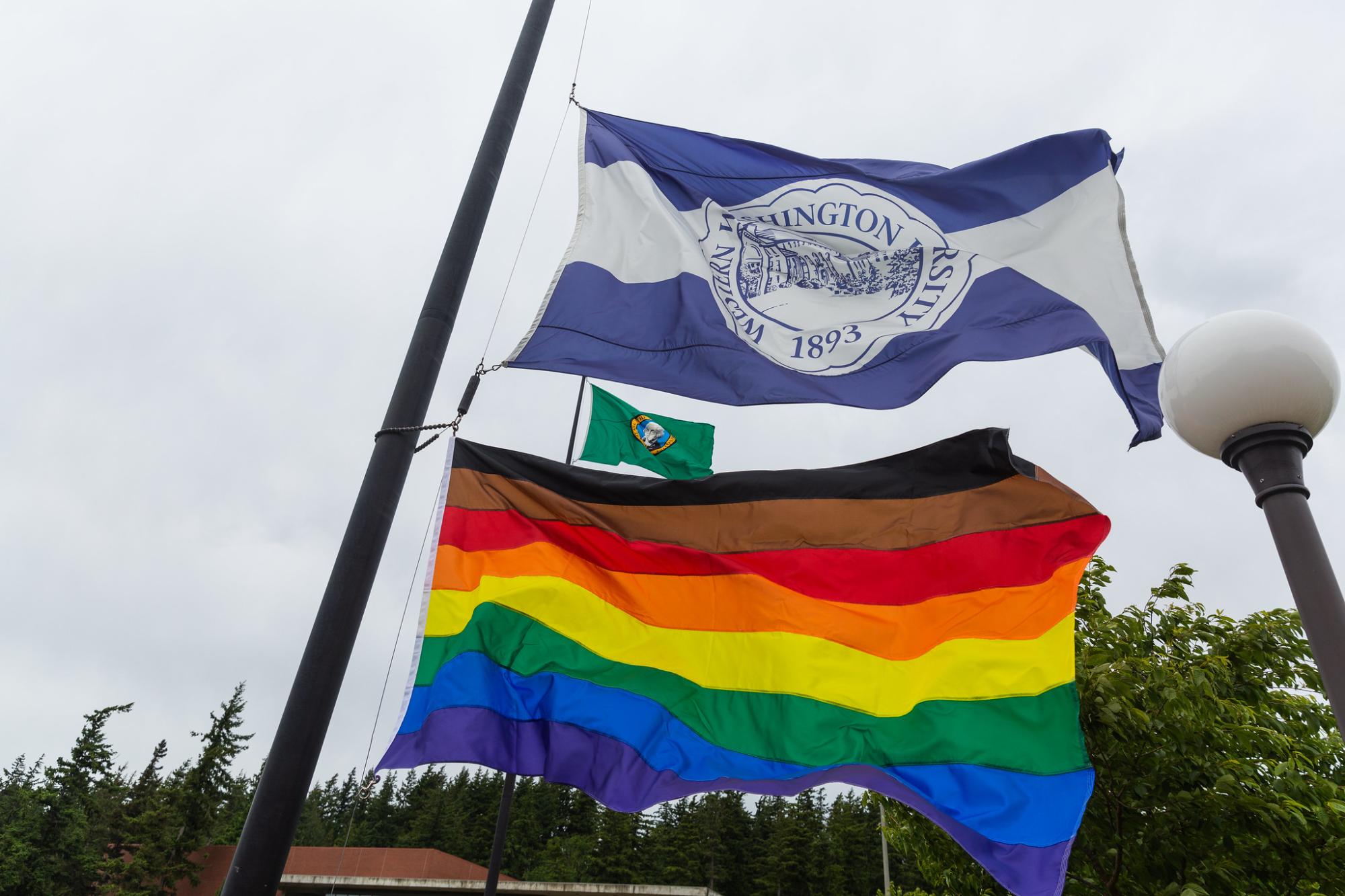 Western flag flown with Pride flag