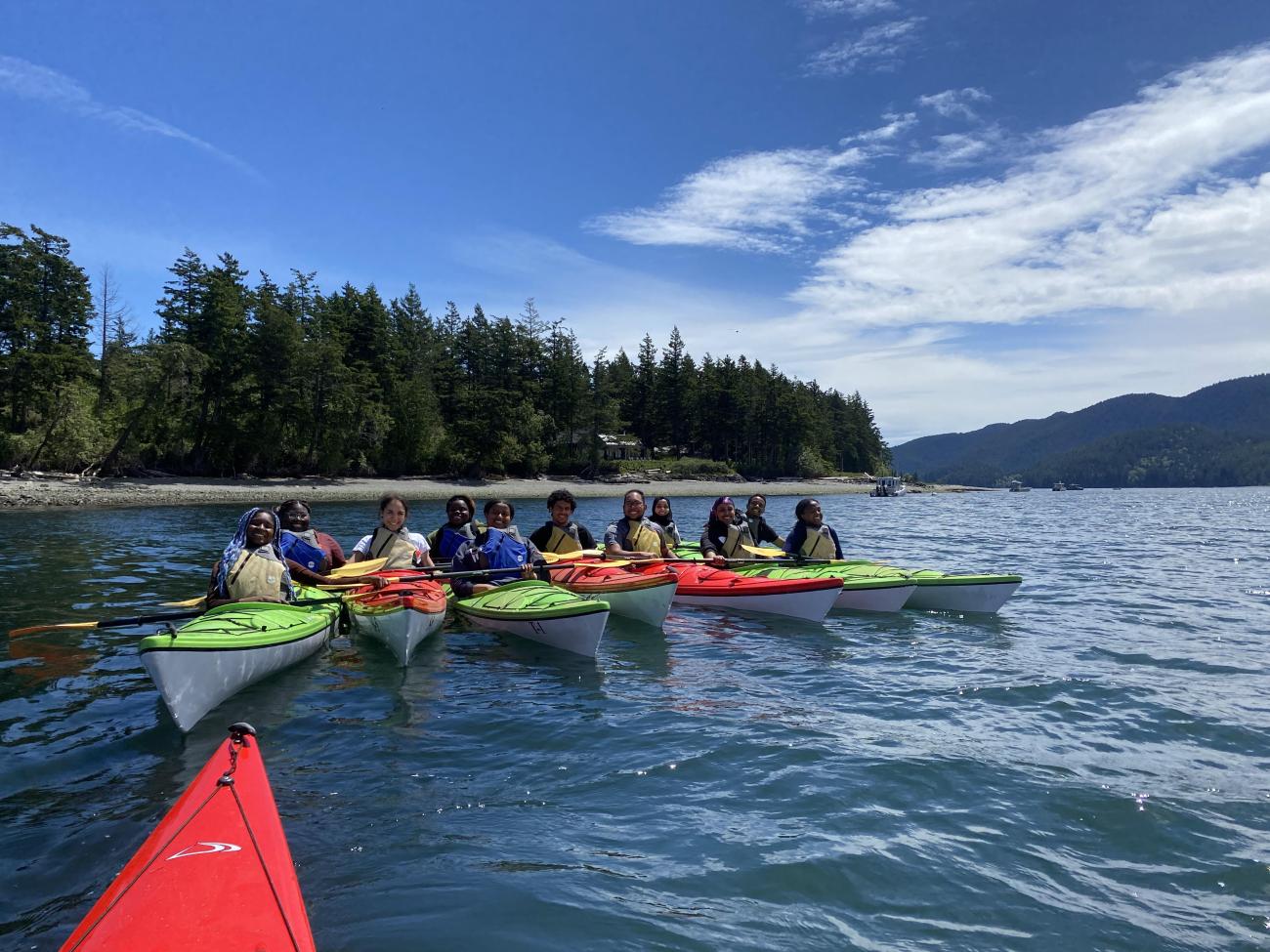 A group of Black Students kayaking together